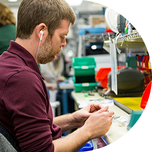 Digital Monitoring Products Plant worker at his station